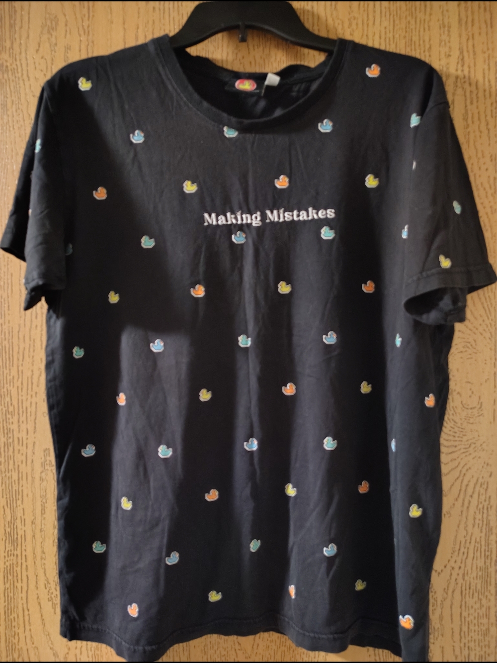 Black 'Making Mistakes' Graphic Tee with Colorful Duck Motif